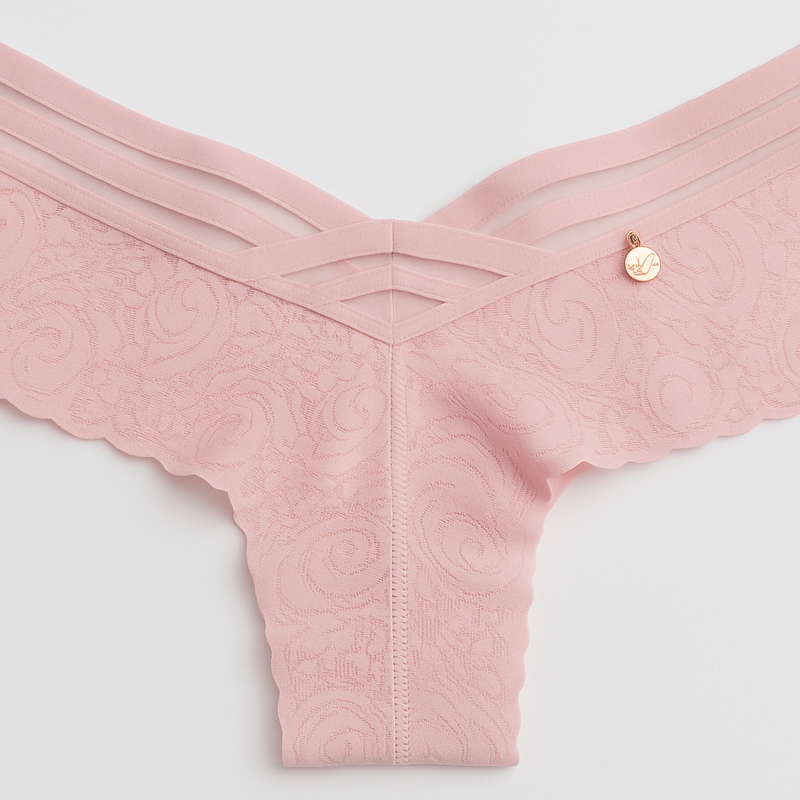 Tríada Blush – Tanga (colaless) rosa palo con tiras en V y encaje jacquard, invisible