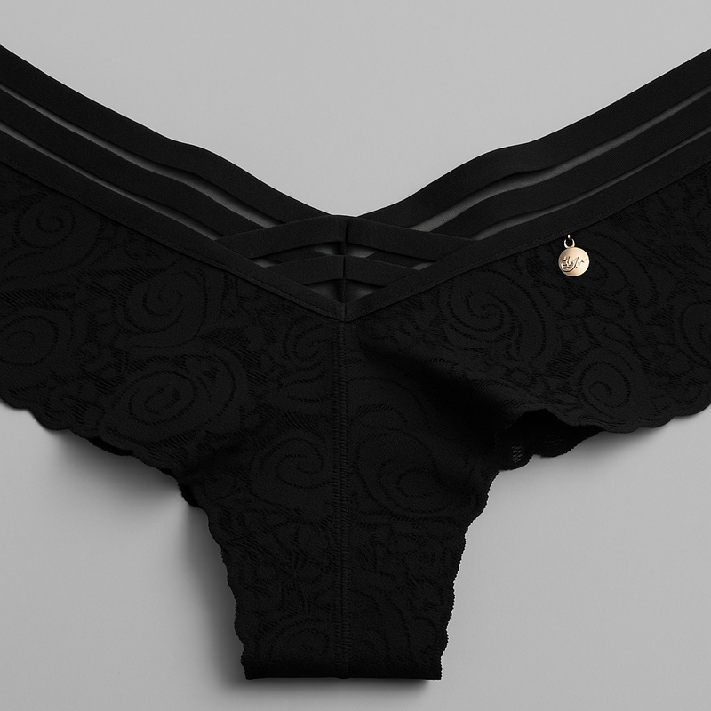Tríada – Tanga (colaless) con tiras en V y encaje jacquard, invisible